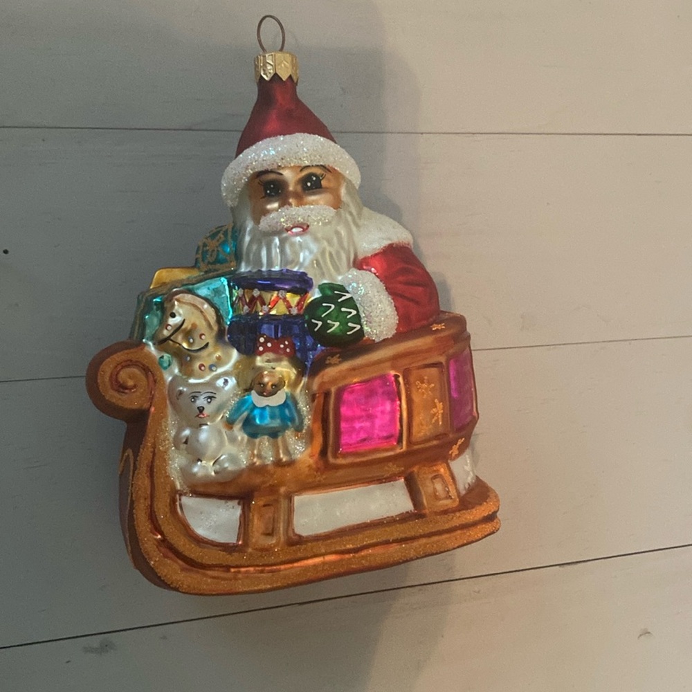 Christopher Radko Santa with his sled ornament